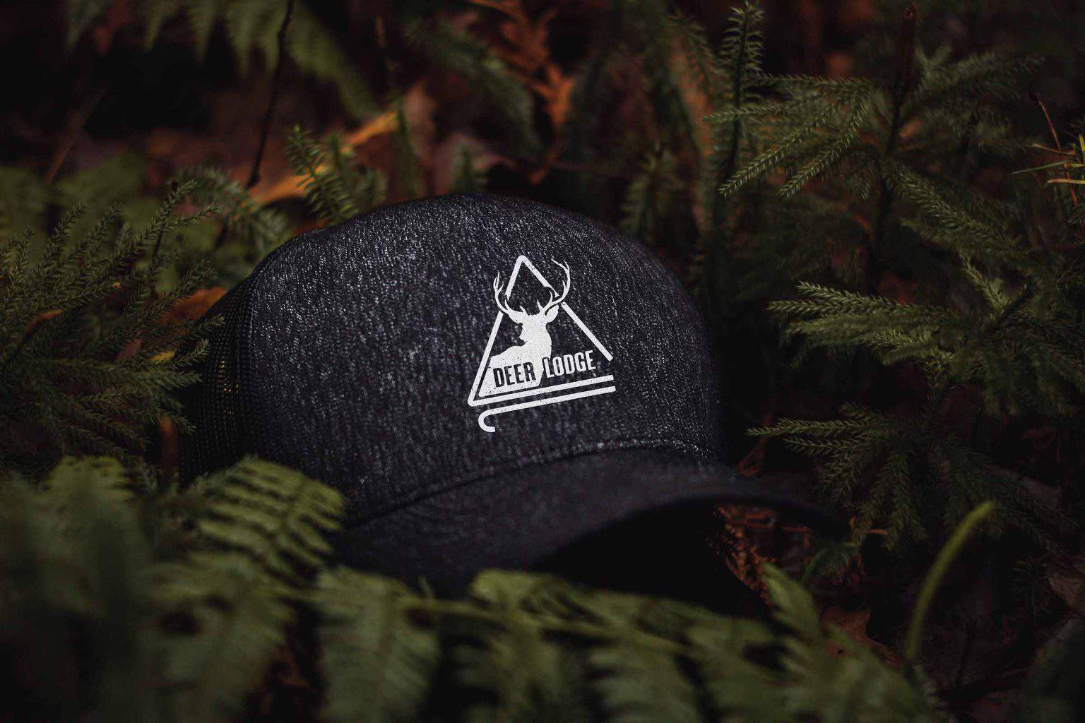 A hat with the Deer Lodge logo.